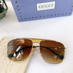 GG0909S occhiali da sole marroni