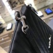 Dettagli perfetti Pochette Saint Laurent nera con hardware argento