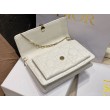 Pochette Dior Lady Dior con catena Cannage bianca